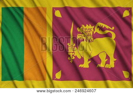 Sri Lanka Flag  Is Depicted On A Sports Cloth Fabric With Many Folds. Sport Team Waving Banner