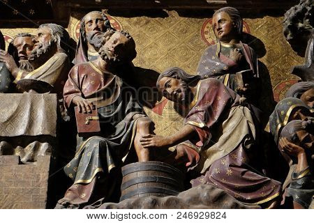PARIS, FRANCE - JANUARY 04, 2018: Intricately carved and painted frieze inside Notre Dame Cathedral depicting Jesus Washing The Feet Of St. Peter, Palm Sunday, UNESCO World Heritage Site in Paris.