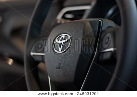 Russia, Izhevsk - April 21, 2018:showroom Toyota. Steering Wheel Of The New Toyota Camry. Famous Wor