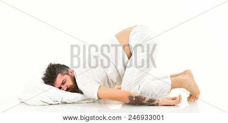 Sleeps Like Baby Concept. Man With Beard And Mustache Fall Asleep Bending His Knees, White Backgroun