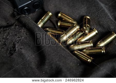 9Mm Semi Autometic Hand Gun With Fmj Bullet On Fabric