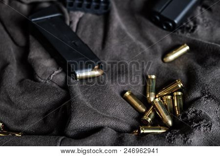9Mm Semi Autometic Hand Gun With Fmj Bullet On Fabric