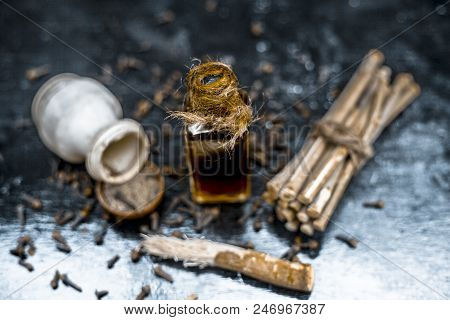 Popular Home Remedy For Toothache Or Tooth Related Problems I.e Clove Oil With Powder Of Black Peppe