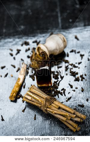 Popular Home Remedy For Toothache Or Tooth Related Problems I.e Clove Oil With Powder Of Black Peppe