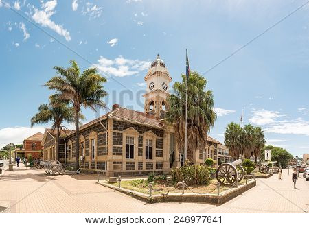 Ladysmith, South Africa - March 21, 2018: A Street Scene, With The Historic Town Hall And Cannons Fr