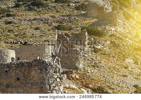 Ruins Of Encient Windmills Built In 15th Century. Lassithi Plateau, Crete, Greece. Most Typical Char