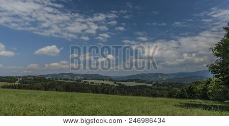 Krkonose Mountains In Blue Sky Cloudy Day Near Roprachtice Village
