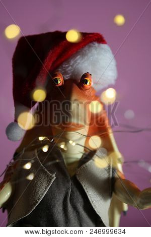 JUNE 22 2018:  Humorous Christmas holiday theme using a Jar Jar Binks action figure from the Star Wars saga