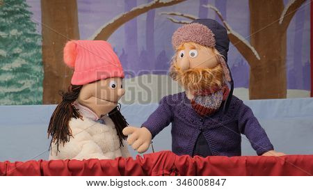 Puppets Talking And Looking At The Camera. Puppet Girl And Puppet Boy Speaking During The Performanc