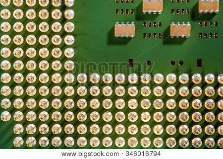 Old Computer Processor With Gold-plated Legs, Microcircuits On It, Top View Super Macro Photo