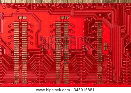 Red Microcircuit Of Old Computer Random Access Memory From Top Side, Top View, Macro Photo