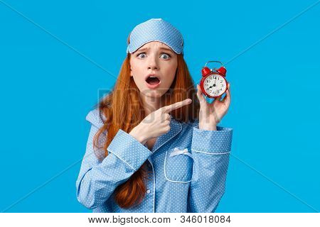 Upset And Disappointed Gloomy Redhead Woman In Nightwear. Sleep Mask, Arguing Boyfriend Didnt Set Up