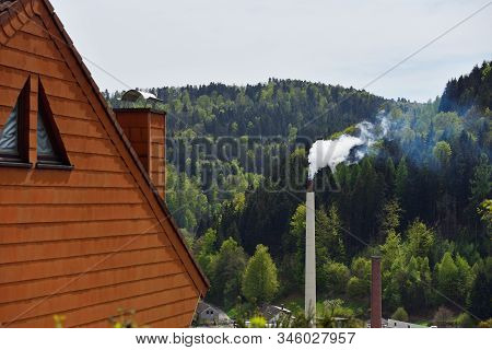 Pectin Factory And Smoking Pipe Against The Background Of The Forest Near The City