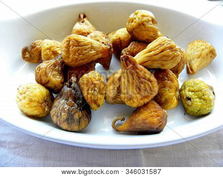 Dried Figs On A White Background Close Up