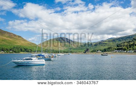 Lochranza Bay With Boats At Anchor. Arran Island, Sailing Trip In Scotland.