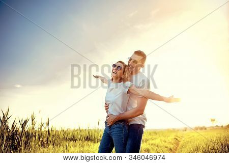 Wonderful Young Couple Hug And Enjoy Life Together With Natural Outdoor Laisure Activity Lifestyle A