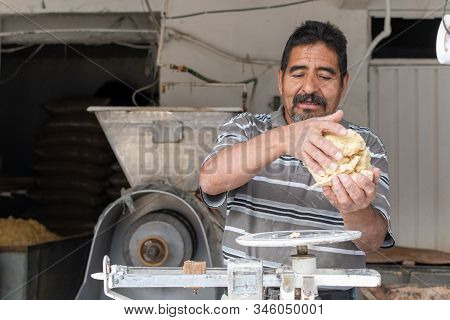 Man Selling Dough In Nixtamal Mill