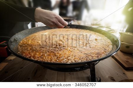 Paella Pan With Traditional Spanish Food Usually Prepared With Rice, Meat, Seafood