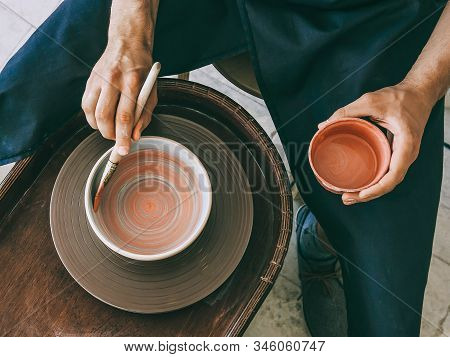Ceramist At A Pottery Workshop Topv View Photo