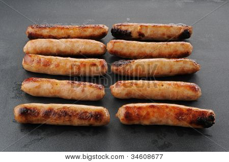 ทำอาหารบน Griddle เป็นไส้กรอกลิงค์