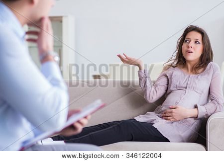 Pregnant woman visiting psychologist doctor