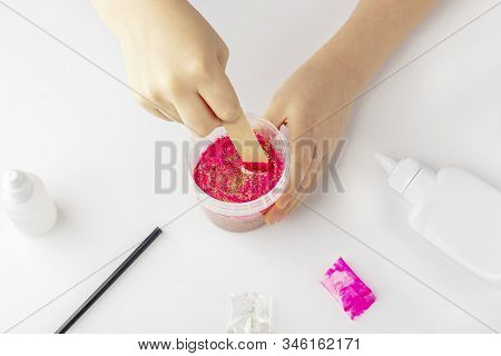 Step By Step Photo Instruction: How To Make Slime At Home. The Concept Of Diy.  Ingridients For Maki