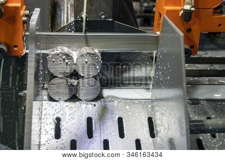 The Operation Of Band Saw Machine Cutting The Metal Rod. The Ingot Material Preparation For Machinin