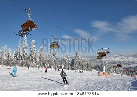Bialka Tatrzanska, Poland - January 11, 2019: Skiers Ski On The Ski Slope In Popular Winter Resort K