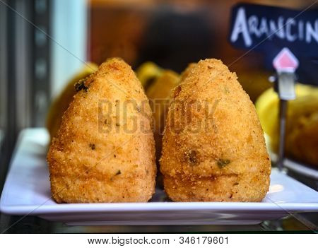 Tasty Italian Street Food, Deep Fried Aranchini Rice Balls With Different Filling Close Up