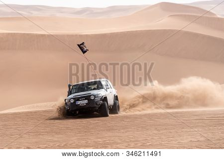 Zahedan, Baluchestan/iran-11/23/2018climbing Sand Dunes In Lut Desert With A Dakar Edition Race Car