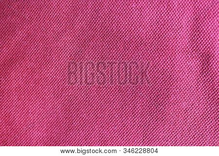 Purple Textured Fabric Background, Colorful Light Red Or Pink Canvas. Empty Clothing Texture Sufrace