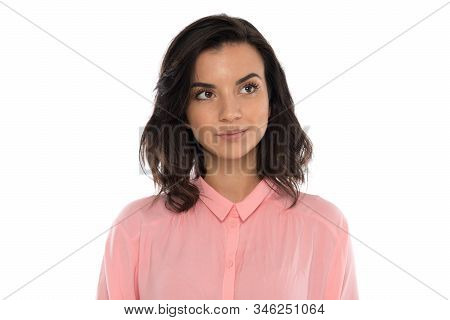 Portrait Of A Young Woman Of 30-35 Years Of Model Appearance, Perhaps She Works As A Manager, Seller