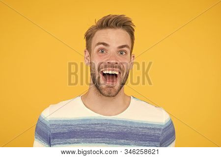 Hes Really Fun And Happy. Happy Man With Big Smile On Yellow Background. Handsome Guy With Beard And
