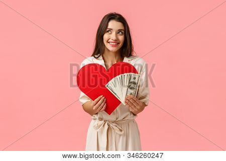 Love, Tenderness And Relationship Concept. Cute And Silly Girl Dreaming Of Wealthy Rich Man And True