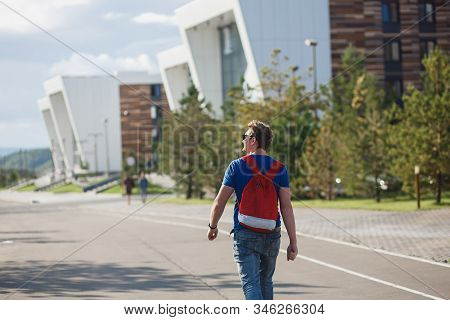 A Male Student Or Graduate Student Near A Modern University. Innopolis, Kazan