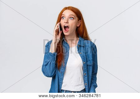 Girl Hears Amazing Great News On Phone. Excited Lucky Redhead Girl Pick-up Phone Realises She Won Ch