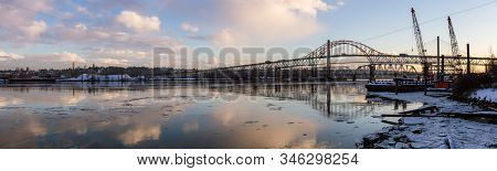 Beautiful Panoramic View Of Fraser River And Pattullo Bridge In The City During A Cold And Icy Winte