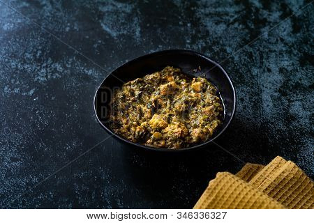 Indian Dish Spinach Lamb Palak With Chappati Flat Bread.