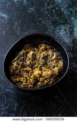 Indian Dish Spinach Lamb Palak With Chappati Flat Bread.
