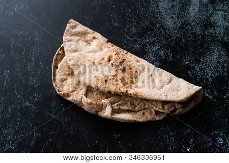 Indian Flat Bread Chappati Folded Style Lavash Ready To Eat Flatbread. Ready To Serve.