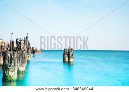 Wooden Breakwater On A Beach In Ustka, Poland, Baltic Sea