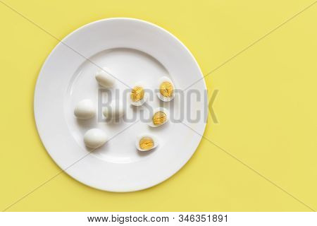 Group, Set Of Peeled Boiled Small Organic Quail Eggs, Whole And Cut In Halves, Halved On A White Pla