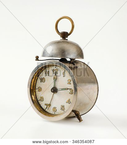 Old mechanical alarm clock with one bell