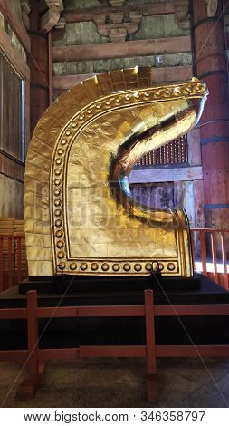 Nara, Japan- 27 Nov, 2019: Golden Horns From The Top Of The Building Displays In Ancient Daibutsuden