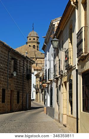 Baeza, Spain - July 28, 2008 - View Of The Cathedral Bell Tower Seen At The End Of An Old Town Stree