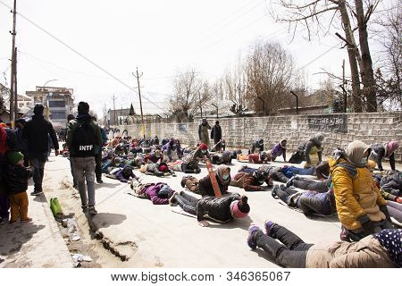 Jammu Kashmir, India - March 20 : Tibetans Walking Parade On The Road For Respect Praying Buddha Cha