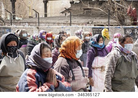 Jammu Kashmir, India - March 20 : Tibetans Walking Parade On The Road For Respect Praying Buddha Cha