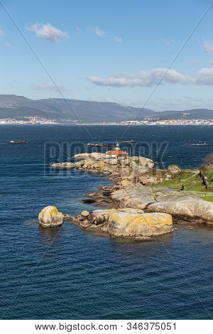 Rias Baixas Seascape With Punta Cabalo Lighthouse. Illa De Arousa, Pontevedra, Spain.