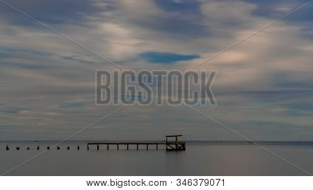 Dilapidated Old Fishing Dock Collapsing Into The Sea In Pak Nam Pran On The Gulf Of Thailand In Thai