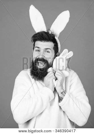 Man Handsome Face Wear White Bunny Ears. Easter Bunny. White Bunny Symbol Of Easter Holiday. Soft An